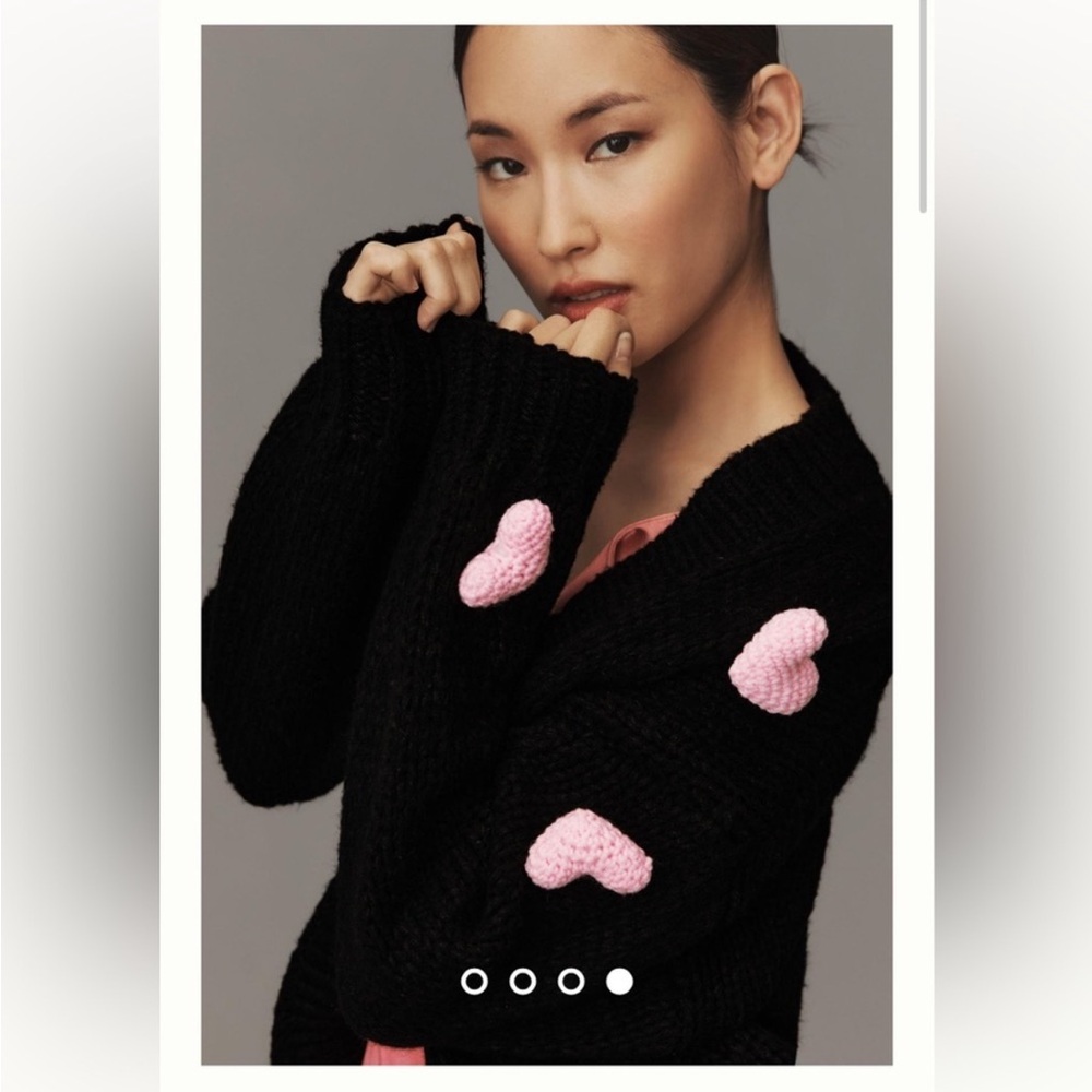 Chic Black Sweater with Pink Heart Accents